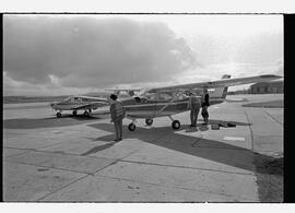 Two small aircraft on ramp