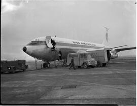 Pan American Airlines (PAA) Boeing 707 jet with restaurant van on tarmac