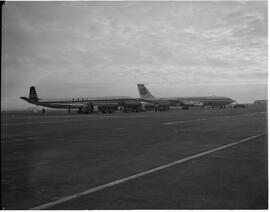 Pan American Airlines (PAA) Boeing 707 jet with a de Havilland Comet 4 jet on tarmac, as used in the press and Times