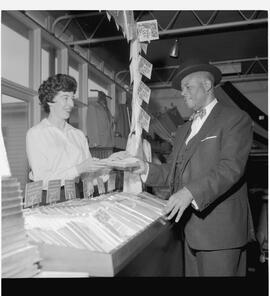 Colonel H.E. Jullian, dealer in arms, ammunition, & military equipment at Linen counter