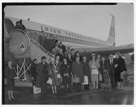 Irish International Airlines aircraft on ramp with people boarding