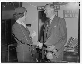 Swissair Manager, Mr O'Neill, with hostess