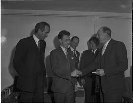 McNab farewell party, shaking hands