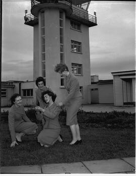Information desk employees under control tower