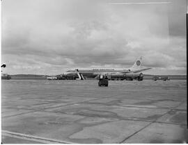 Pan American Airlines (PAA) loading cargo onto jet