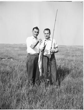Mr J Murphy and a pike fish he caught