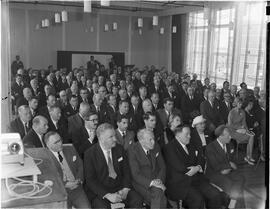 Guests at community hall during Teachtaí Dála visit