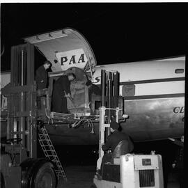 Sequence of unloading special cargo from Pan American Airlines (PAA) planes at Shannon Airport