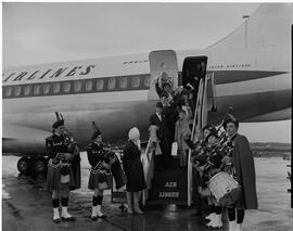 Pipers pipe at Aer Lingus plane, Whelan family departing to US