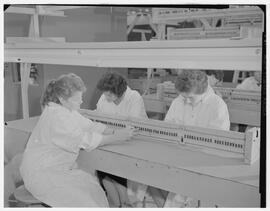 SPS factory - Three girls at bench