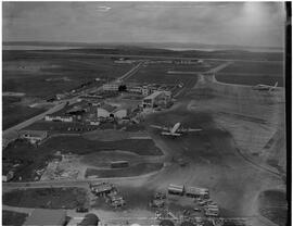 Aerial - Super Connie jet on ramp