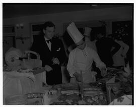 Chef Andrew Fernon working on a seafood dinner with Mr O'Malley, President of the Food and Wine Society