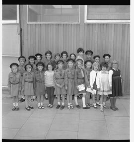 Young Irish girl guides at community hall