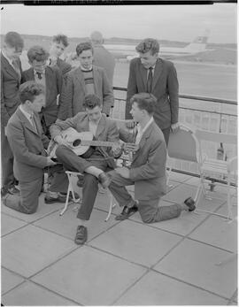 Group of boys in public viewing spaces