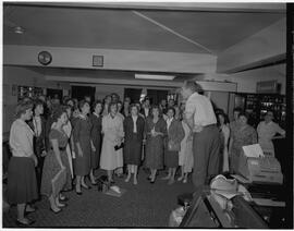 The Knoxville Choir singing in the Transit Lounge