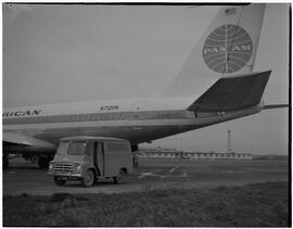 Pan American Airlines (PAA) Boeing 707 jet with restaurant van on tarmac