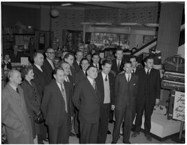 Group of people at the opening of the Roche's window display in Limerick