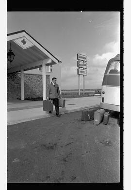 Porter with luggage at international hotel