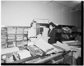 Passengers arriving at new shop in Shannon, featuring Miss K.A. Bittwer at the Tweeds counter