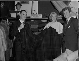 Ted Kennedy, brother of the President of the United States, with tweed rug in shop