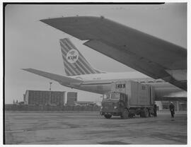 CIE freight truck at KLM Royal Dutch Airlines plane