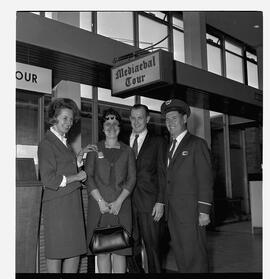 Trans World Airlines (TWA) contest winners at Medieval Tour desk