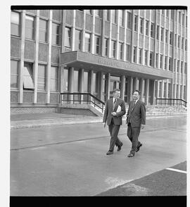 Brendan O'Regan and a man at Shannon Free Airport Development Company (SFADCo) Office