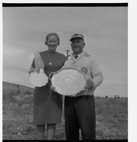 Mrs W. Ryan and Charlie with angling trophy