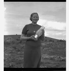 Mrs W. Ryan with angling trophy